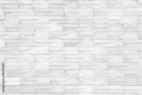 Seamless texture of white grey brick stone wall a rough surface, with space for text, for a background....