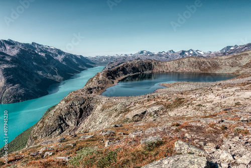 Fototapeta Naklejka Na Ścianę i Meble -  Famous Besseggen trail in Norway. Two azure lakes in the mointains. Epic trekking and view.