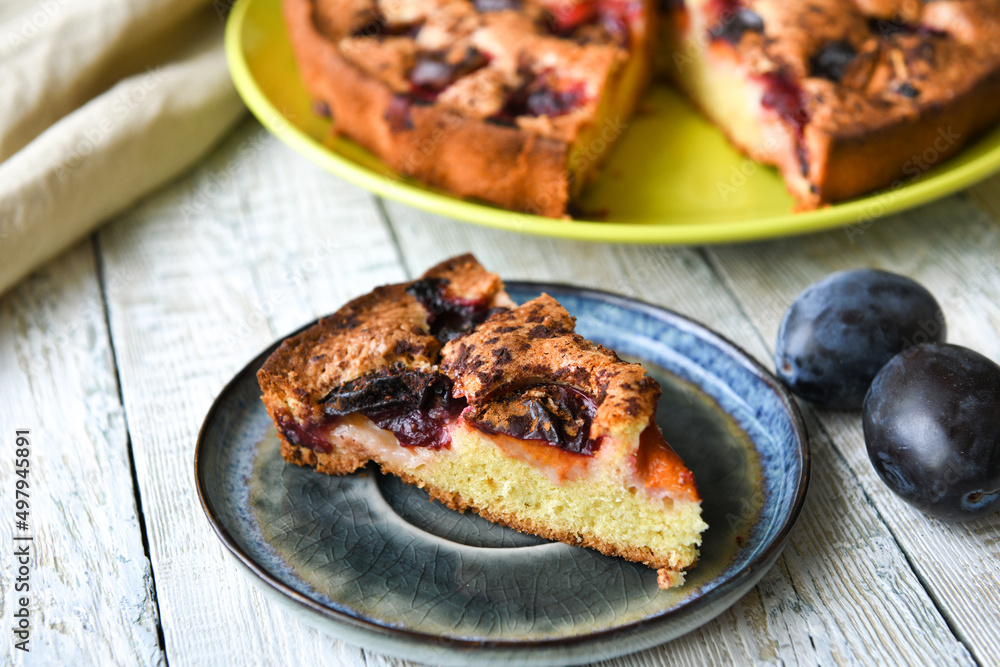 Piece of homemade plum cake with cinnamon. Piece of homemade plum cake with cinnamon.