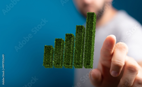 green growing on top in nature green background. Money saving, investment © vegefox.com