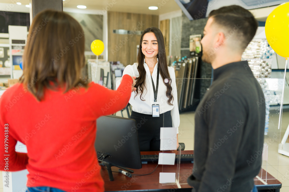 Clients buying their furniture at the store Clients buying their furniture at the store
