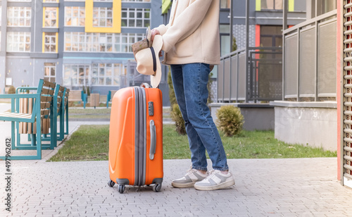 Traveler with suitcase concept.Young girl walking with carrying luggage and passenger for tour travel booking ticket flight at international vacation time.