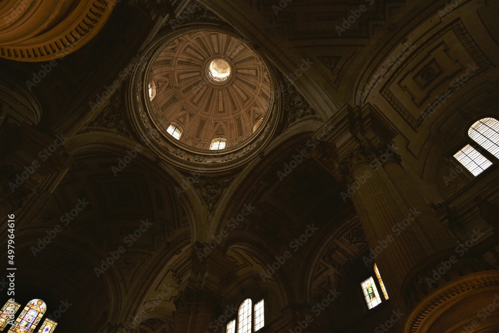 Elegantly coffered and decorated main dome above the transept of Jaén Cathedral, embedded in an ensemble of columns and vaults expressing pure Spanish Renaissance style, Jaén, Spain Elegantly coffered and decorated main dome above the transept of Jaén Cathedral, embedded in an ensemble of columns and vaults expressing pure Spanish Renaissance style, Jaén, Spain