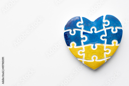 Heart with Ukrainian flag - Concept of stop war and pray for Ukraine