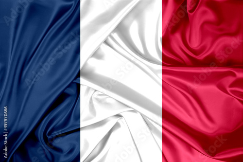 National flag of France hoisted outdoors. France Day Celebration
