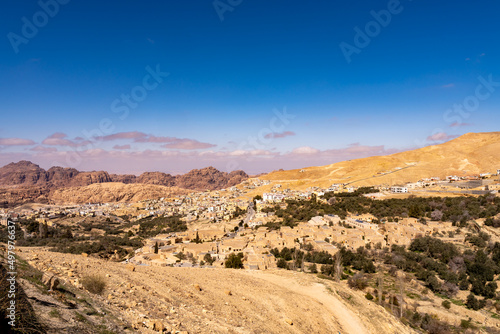 Overlook view of Wadi Musa, Jordan and the mountains of Petra in the background