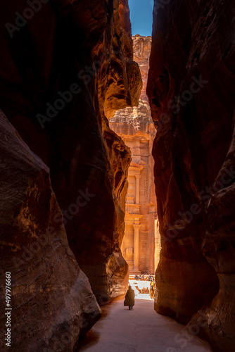 Glimpse of the Treasury seen through the slot canyon Siq in Petra, Jordan