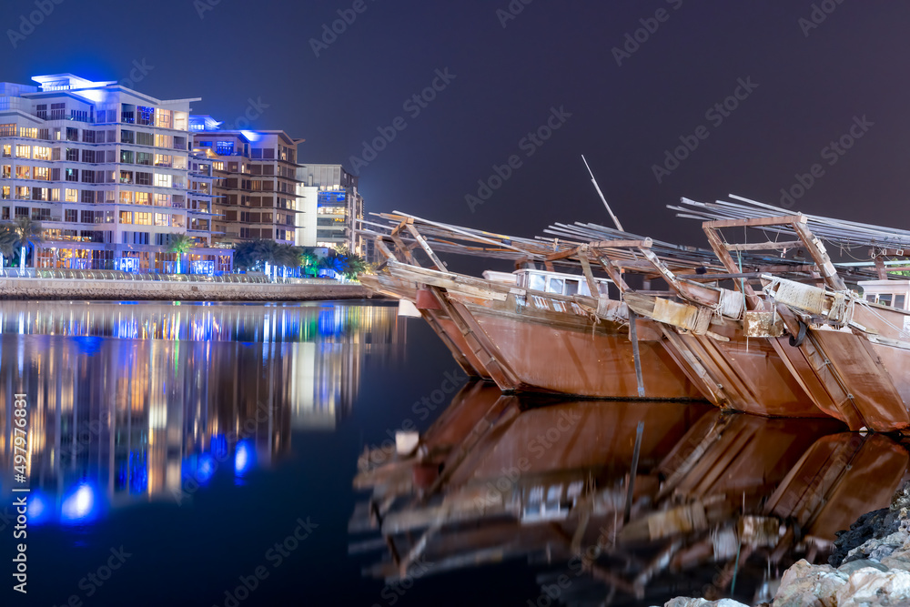 Pearl diving boats at the pier in Manama, Bahrain at night