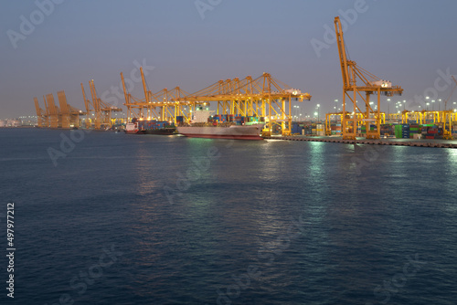 Container terminal in port at night photo