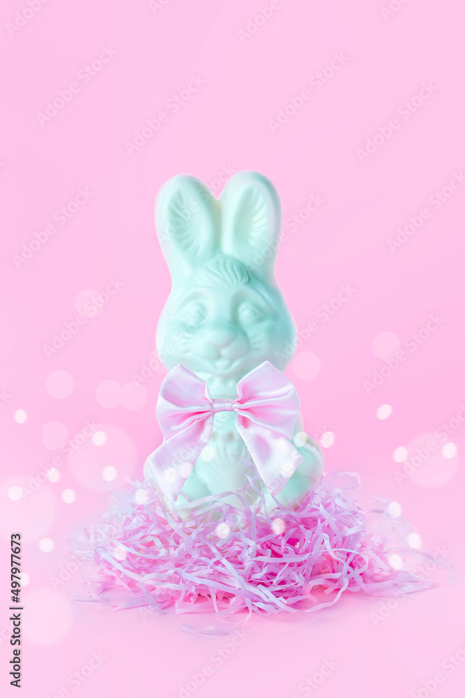 Postcard with Easter bunny on pink background, toned.