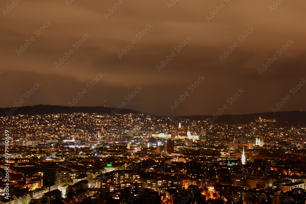 Panorama of the city of Zurich at night from the city