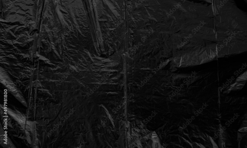 black plastic bag texture, wrap texture on a black background wallpaper