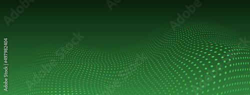 Abstract halftone background with curved surface made of small dots in green colors