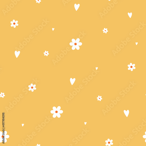 Seamless pattern with cute small flowers and hearts on yellow background.