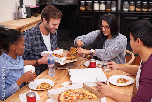 Yumminess awaits. Cropped shot of a group of friends enjoying pizza together.
