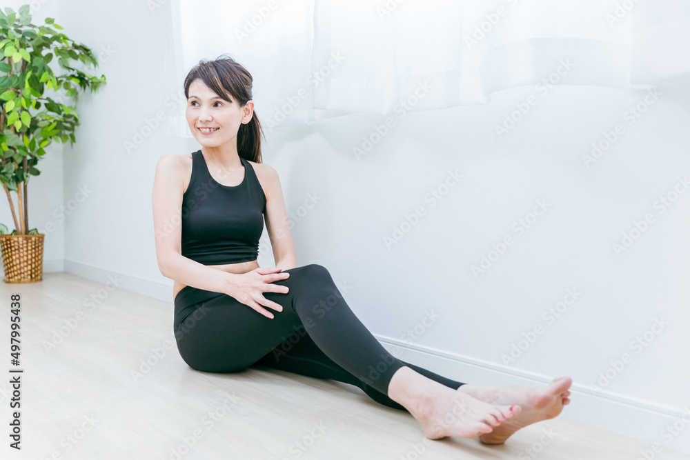 Fototapeta premium スポーツウェアを着た女性 