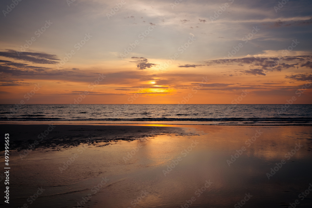 Beautiful Sunset Over The Beach and Ocean