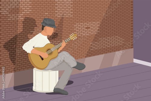 male musician playing guitar
