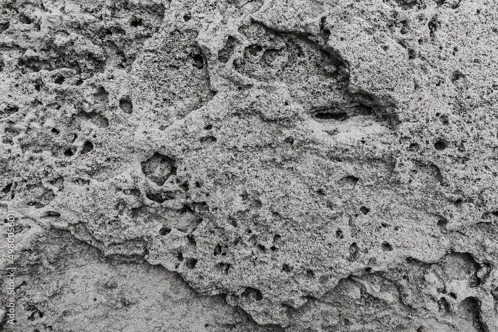 Black and white Background of Stone Wall texture. Natural Texure Photo. Stone texture or background. Concrete. Black and white Background of Stone Wall texture. Natural Texure Photo. Stone texture or background. Concrete.