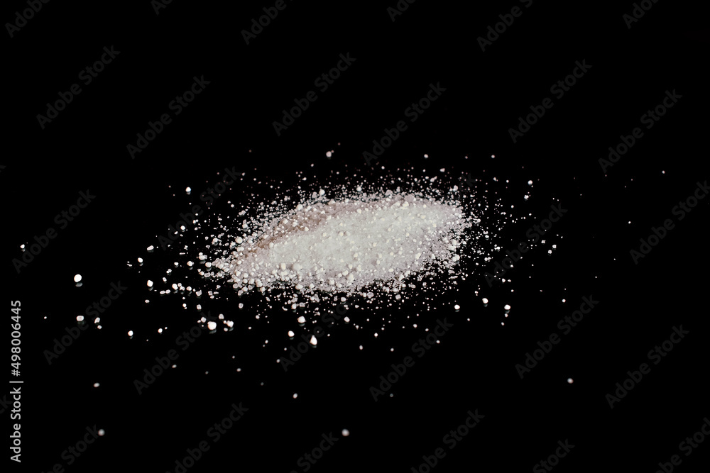 Fototapeta premium Drug addiction. A pile of white powder on a black background with reflection