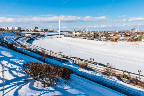  the river Tura embankment in Tyumen, Russia,
a primary promenade for Siberia's oldest Russian city photo