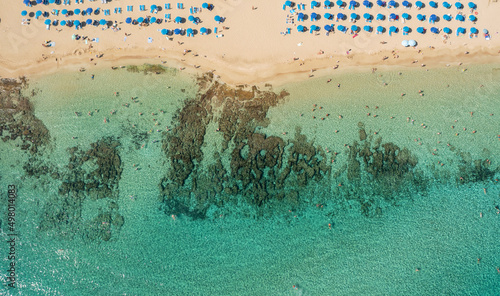 beach line and coral reef on the Mediterranean Sea in Protaras, Cyprus, aerial view