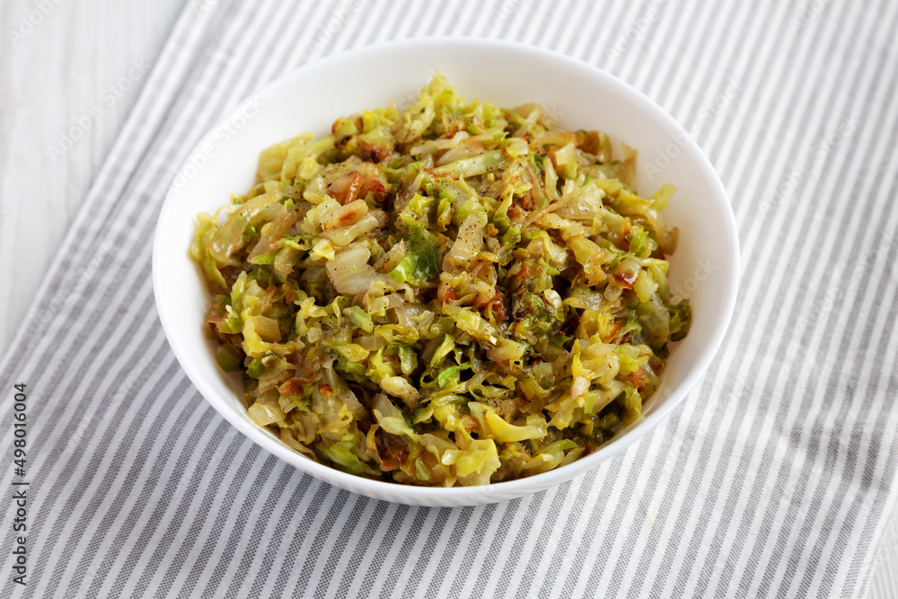 Homemade Irish Sauteed Cabbage in a Bowl, side view. Homemade Irish Sauteed Cabbage in a Bowl, side view.
