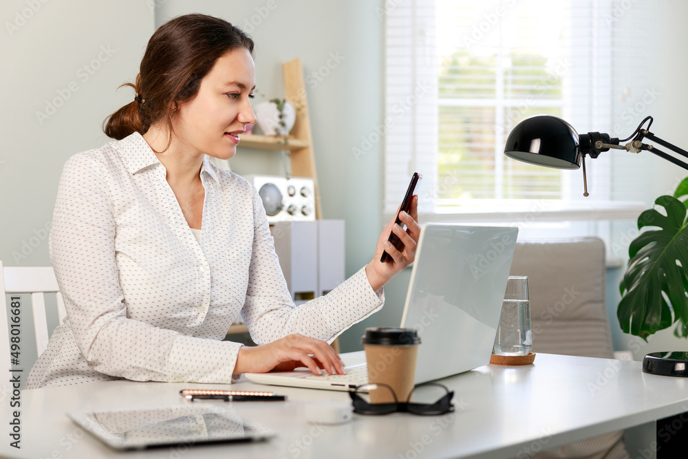 Young woman working at home Young woman working at home
