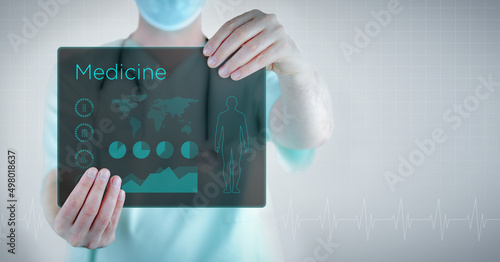 Medicine. Doctor holding virtual letter with text and an interface. Medicine in the future