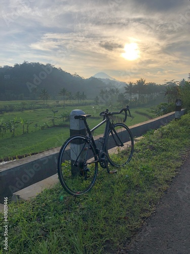 roadbike on the field with sunrise