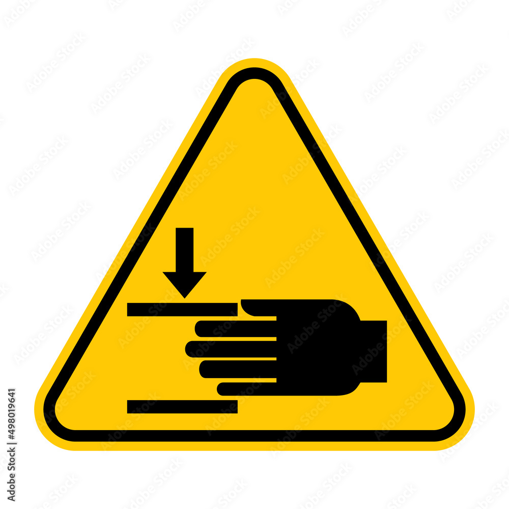 Crushing of hands sign. Vector illustration of yellow triangle warning sign with hand crush force from above icon inside. Safety symbol isolated on white background. Risk of hand injuries. Crushing of hands sign. Vector illustration of yellow triangle warning sign with hand crush force from above icon inside. Safety symbol isolated on white background. Risk of hand injuries.