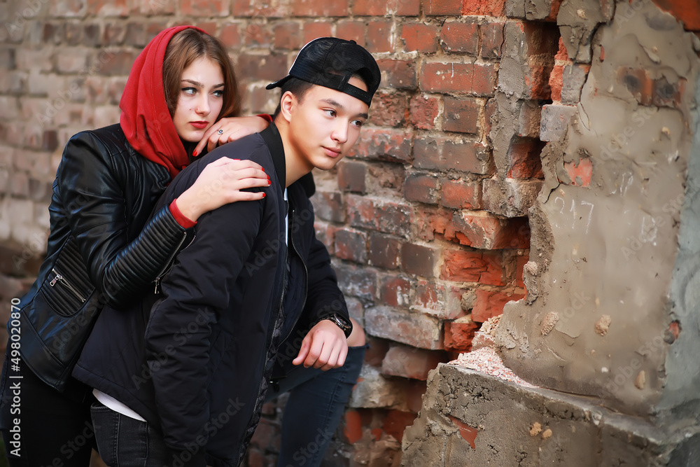 Loving couple walking in casual clothes Loving couple walking in casual clothes