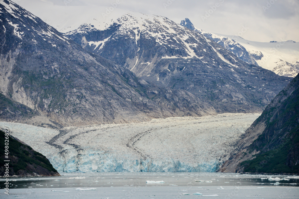 Beautiful landscape on Alaska with snow capped mountains valleys of ice.