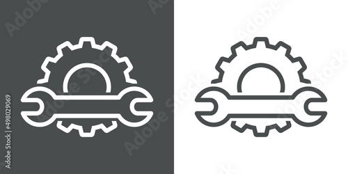 Maquinaria industrial. Logotipo con rueda dentada con silueta de herramienta llave con líneas en fondo gris y fondo blanco