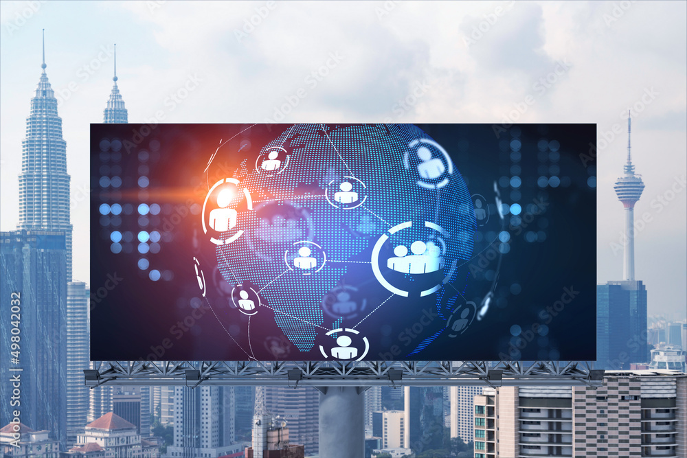 Φωτογραφία World planet Earth map hologram and social media icons on billboard over panorama city view of Kuala Lumpur, Malaysia, Asia
