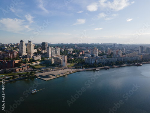 Dnipro, Ukraine. View of the central part of the city, the embankment of the Dnieper. Top view from a great height. Panoramic view of the city. Right bank of the city © Denis Chubchenko