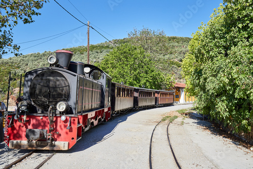 The famous narrow gauge railway train of Thessaly - Pelion, Greece, at the station of Ano Gatea photo