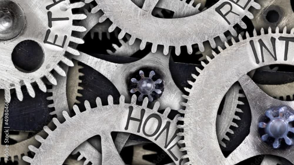 Group of rotating tooth wheels with Ethics, Respect, Honesty and Integrity sign imprinted on metal surface. High quality 4k video. Group of rotating tooth wheels with Ethics, Respect, Honesty and Integrity sign imprinted on metal surface. High quality 4k video.
