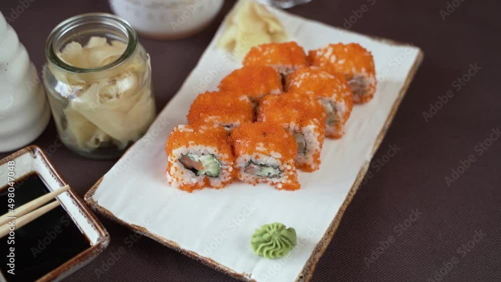 Sushi with cucumber, salmon and red caviar Sushi with cucumber, salmon and red caviar