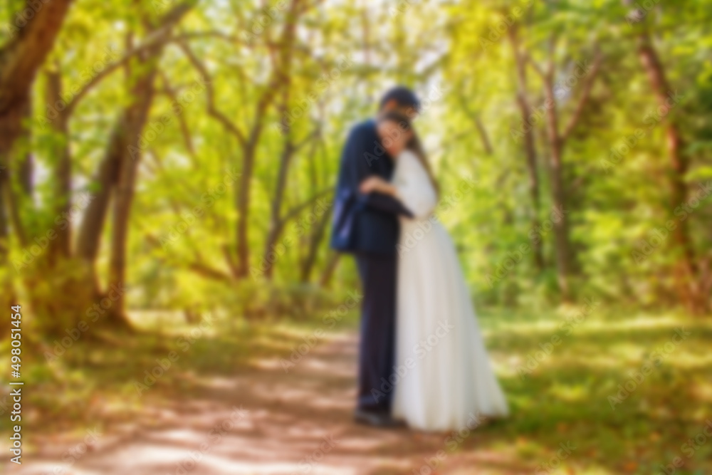 Bride and groom on nature background