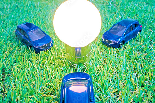 Wallpaper Mural grass and 3 cars and light bulb Torontodigital.ca