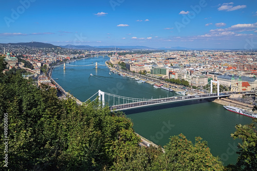 Budapest, Hungary. High angle view on the city with main landmarks and Danube river with bridges. View from Gellert Hill.