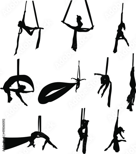 Gymnastics on canvases black silhouette, Aerial gymnastics. Gymnastics on canvases. Gymnastic elements. Stretching for gymnasts.Gymnast in the air. The splits. The splits in the air.