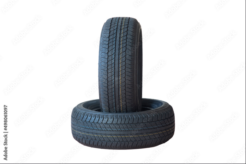 Summer winter tires on a white background.New car tires. Summer winter tires on a white background.New car tires.