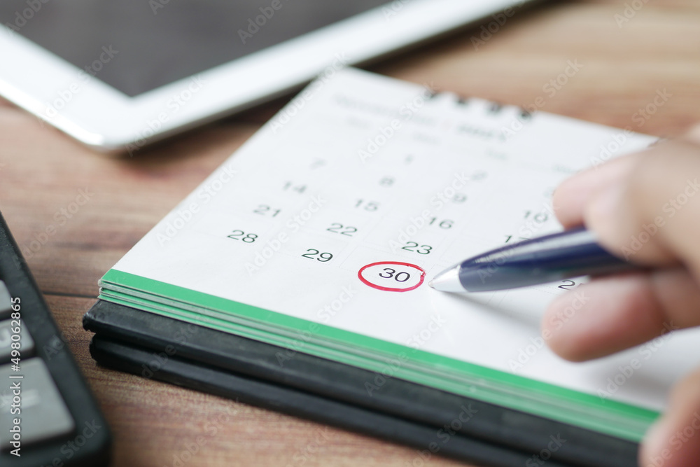 Fototapeta premium deadline concept with red mark on calendar date 