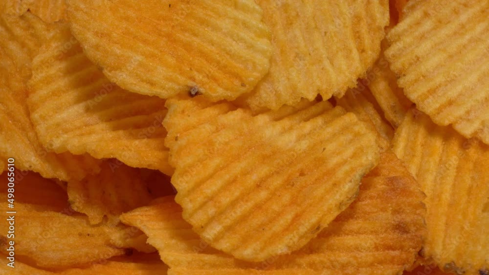 Potato crisps chips background. Selective focus Potato crisps chips background. Selective focus