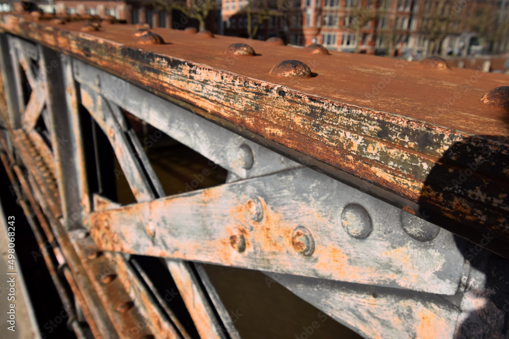 Detail of weathered, metal bolted bridge in Speicherstadt / Hafencity, Hamburg, Germany