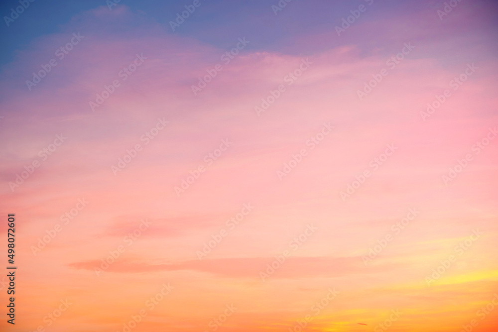 Fototapeta premium beautiful orange clouds and sunlight on the blue sky perfect for the background, take in morning,Twilight