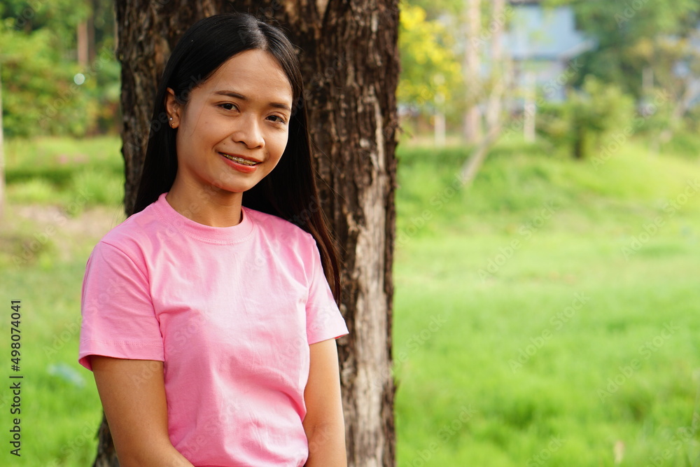 Asian woman tourists smile happily. Asian woman tourists smile happily.