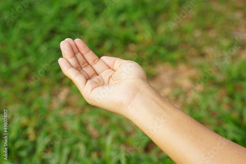 woman extending her hand in front © buraratn